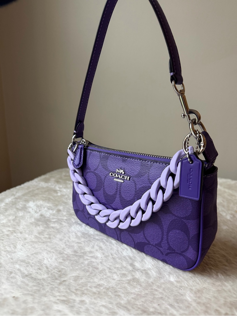 Coach Nolita 19 in purple with chain charm